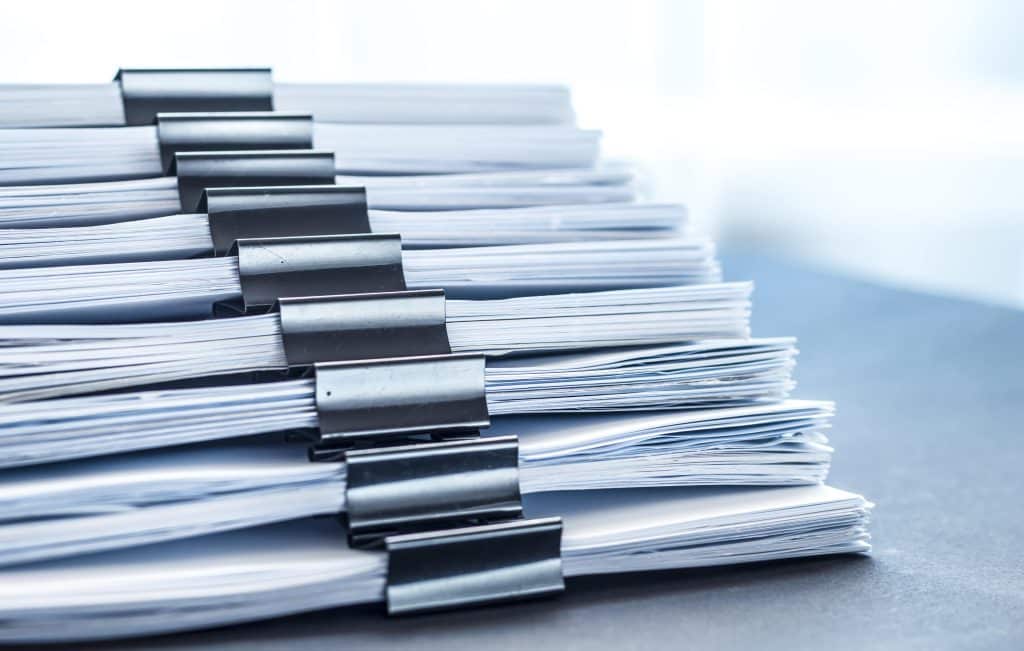 stacks-documents-files-with-black-clip