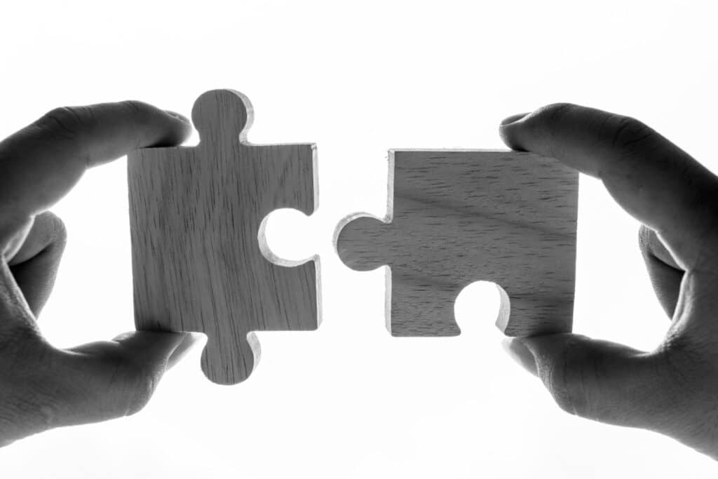 Macro shot of jigsaw puzzles dependency concept