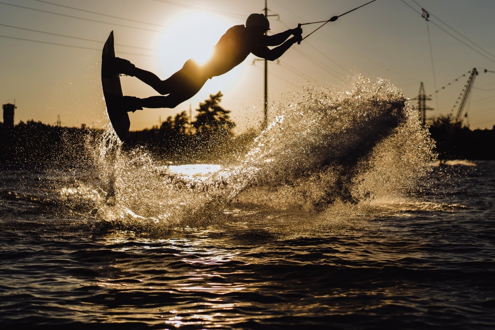 Wakeboard. wakeboarding jumping at sunset
