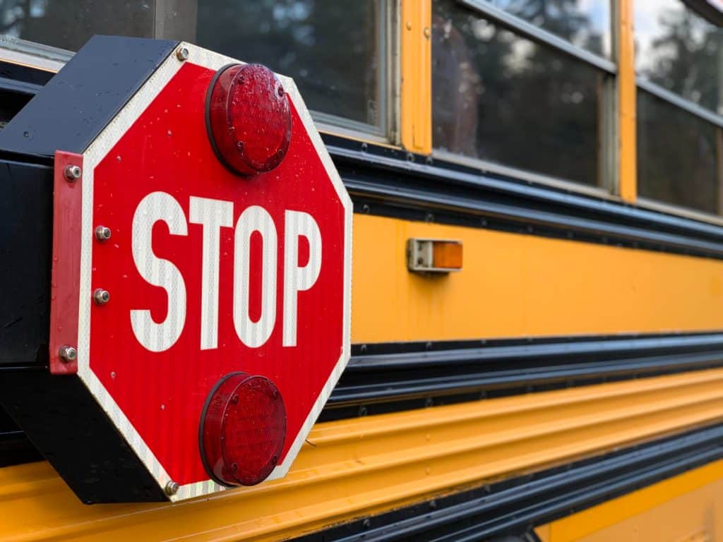 Close-up of stop sign on school bus 