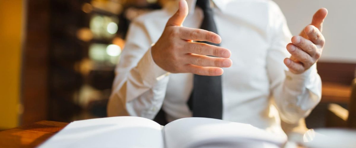 Man with gesture of explanation