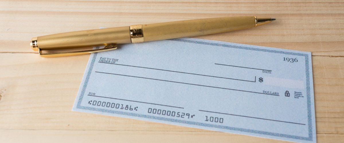 Banking Check with magnifier glass