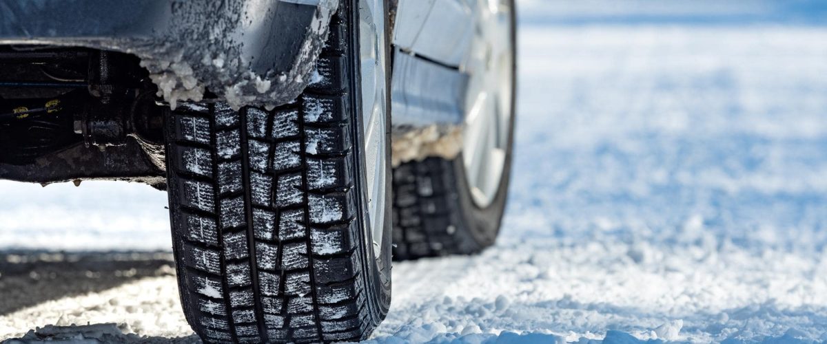 Close-up of tire tracks in snow