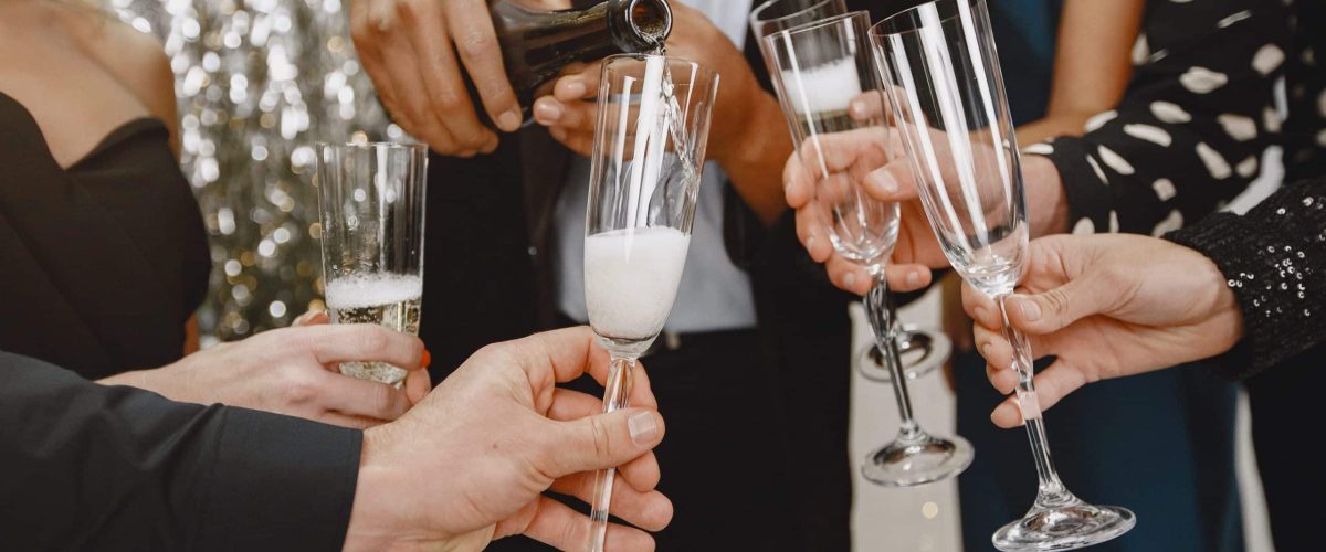 group-young-people-celebrating-new-year-friends-drinks-champagne-min