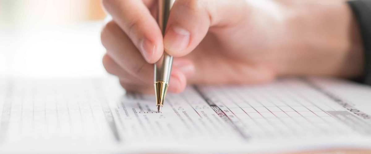hand-with-pen-application-form