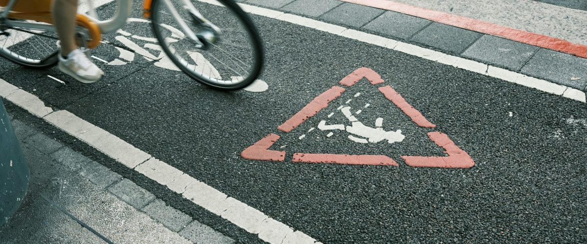 cyclist on pedestrian crossing