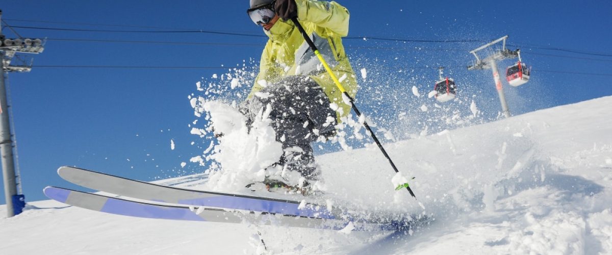 Fist bump of two male snowboarders