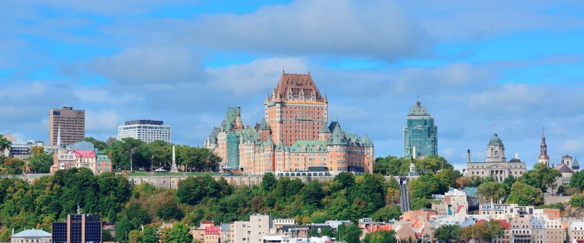 quebec-city-skyline-river-with-blue-sky-cloud-min