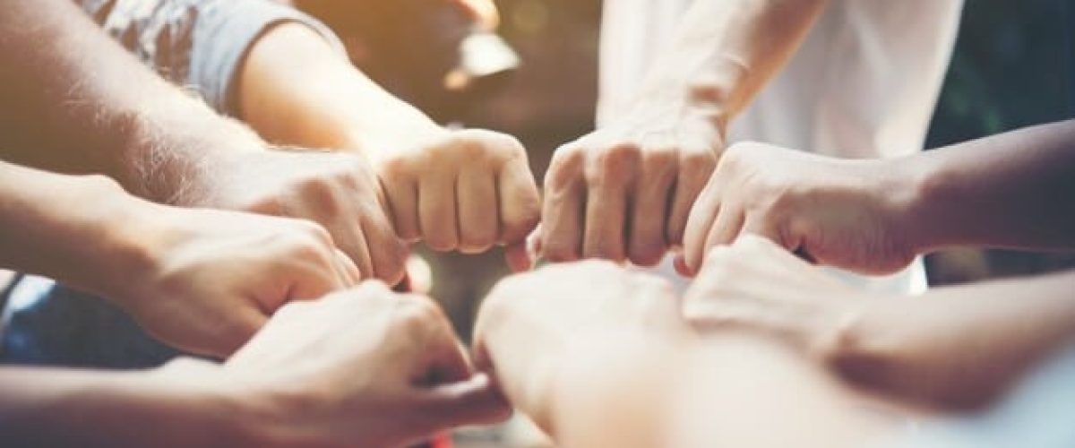 image of hands held together